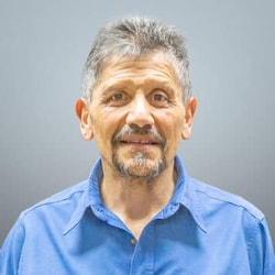 A person in a blue shirt

AI-generated content may be incorrect.